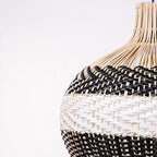 Chic rounded pendant light hand woven in white or black wicker
