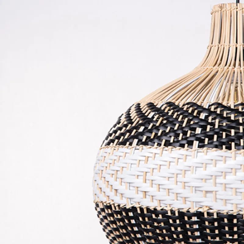Chic rounded pendant light hand woven in white or black wicker