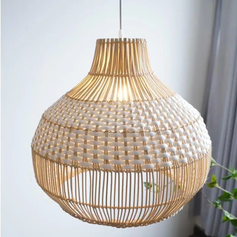 Chic rounded pendant light hand woven in white or black wicker