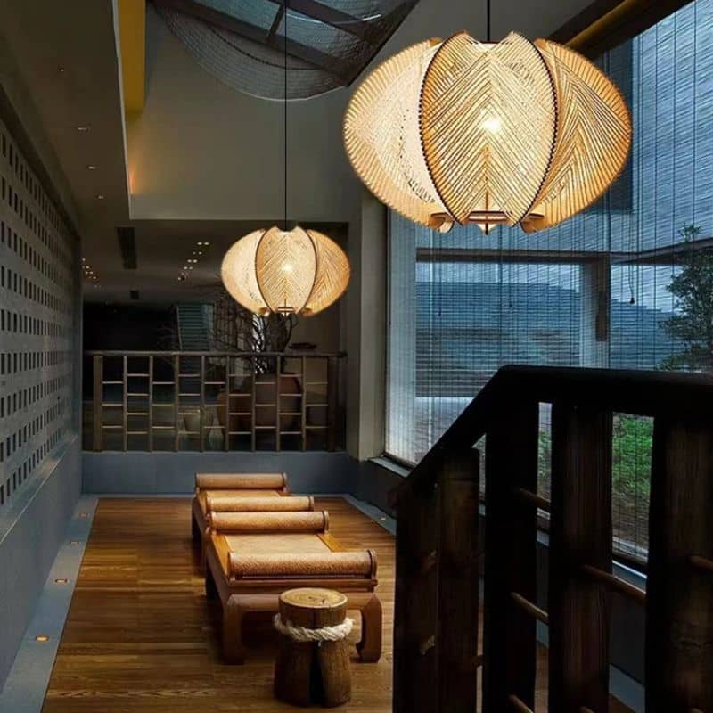 Large chic pendant light with turned wood structure and hand woven shade