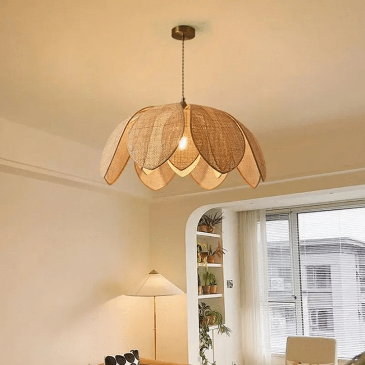 Chinese style pendant light with hand woven rattan petals flaring around an iron frame