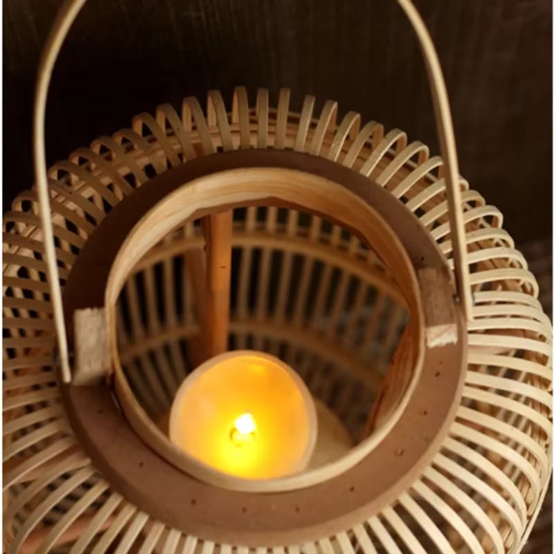 Oval Chinese style hand woven rattan candle lantern with crisscross pattern