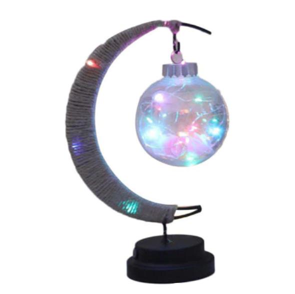 Crescent moon lamp with a hand woven hemp frame and a round color changing globe bulb