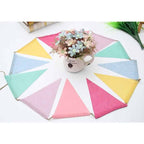 Colorful linen pennant banner with 12 flags on a rope