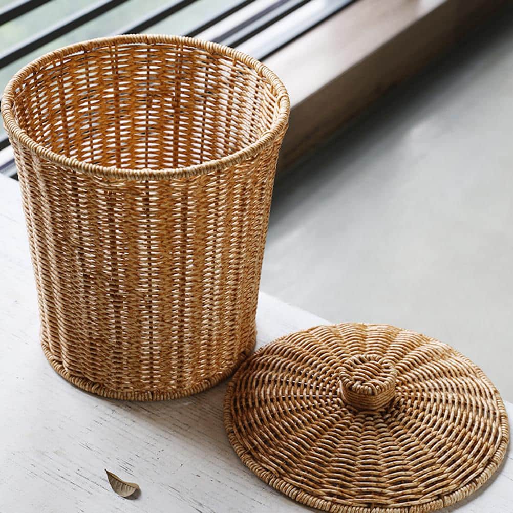 Compact woven rattan trash can with a fitted lid