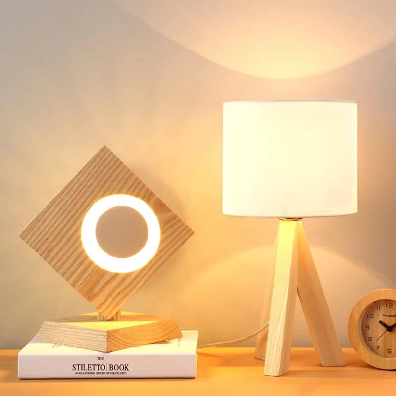Slender contemporary bedside lamp in light natural wood