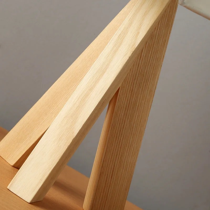 Slender contemporary bedside lamp in light natural wood