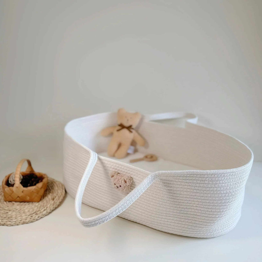 Gray cotton rope changing basket with a bear face and handles