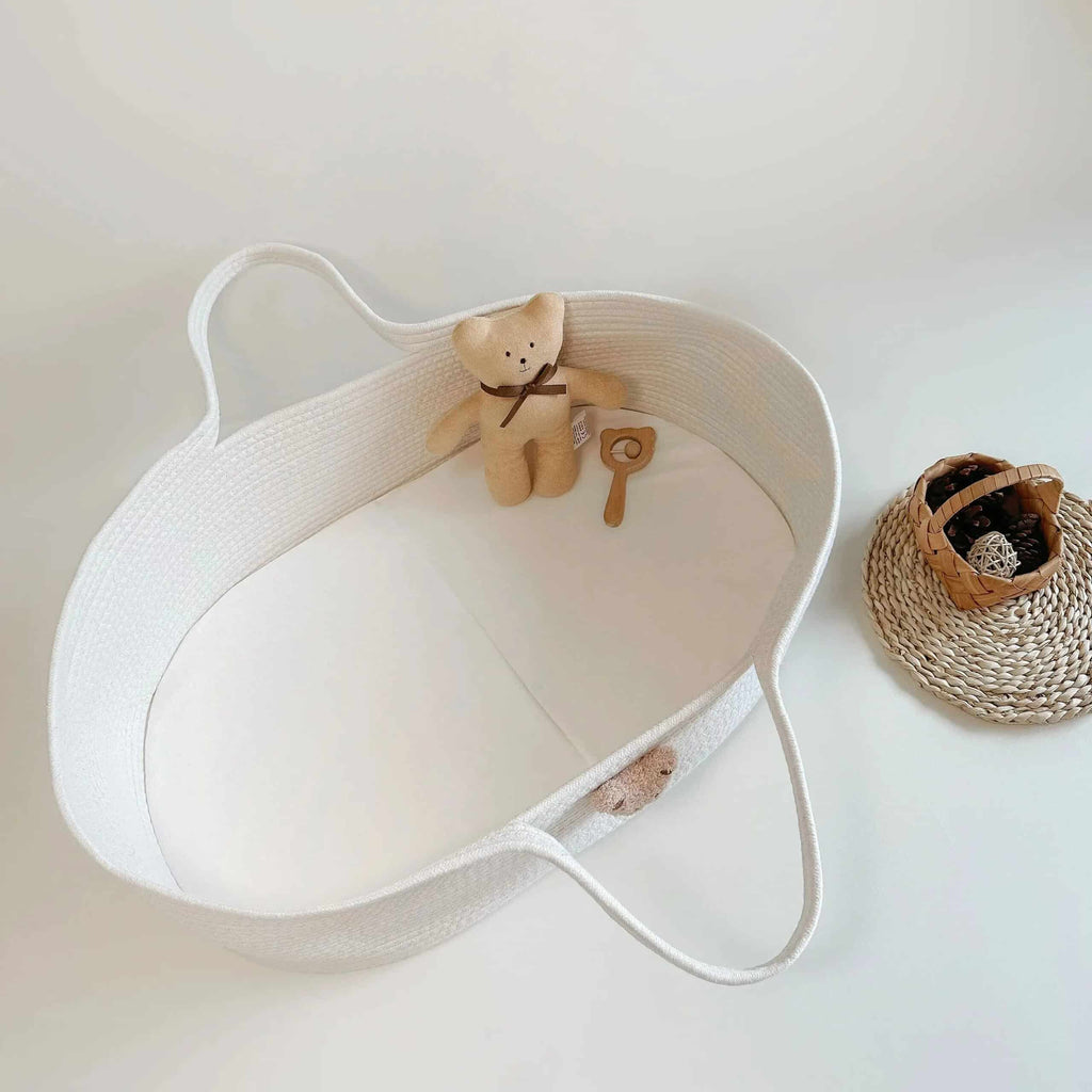 Gray cotton rope changing basket with a bear face and handles