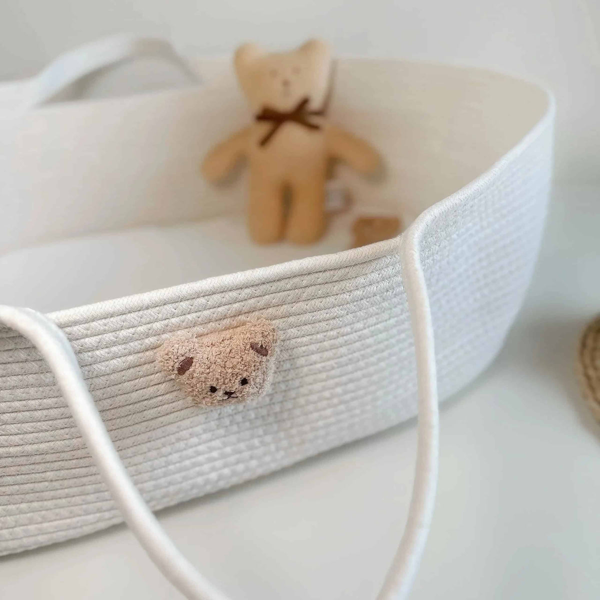Gray cotton rope changing basket with a bear face and handles