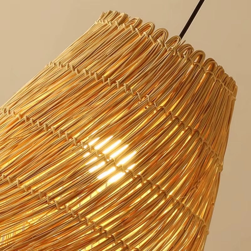 Modern pendant light with hand woven rattan arches radiating around the diffuser