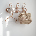 Round hand woven dark rattan wall hook with three hooks