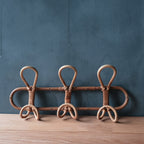 Round hand woven dark rattan wall hook with three hooks