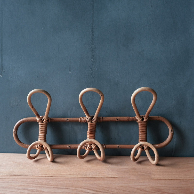 Round hand woven dark rattan wall hook with three hooks