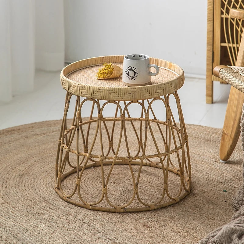 Designer side table hand woven in beige wicker with clean curves
