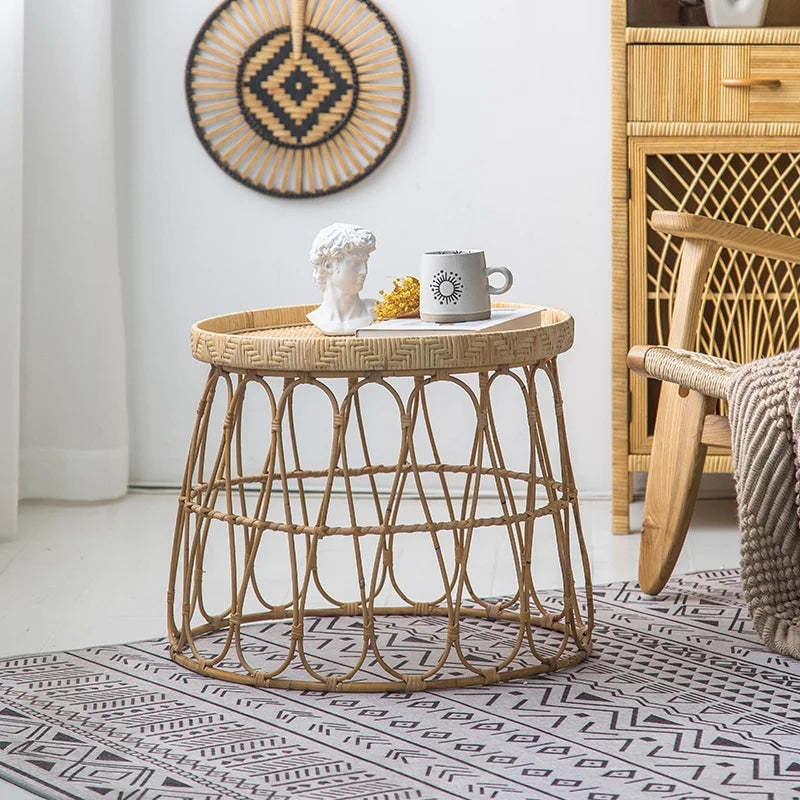Designer side table hand woven in beige wicker with clean curves