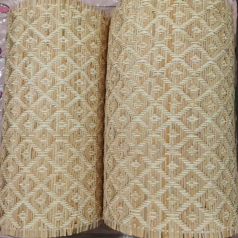 Sheet of natural rattan cane webbing with a diamond weave