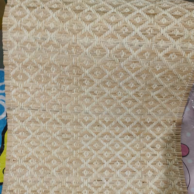 Sheet of natural rattan cane webbing with a diamond weave