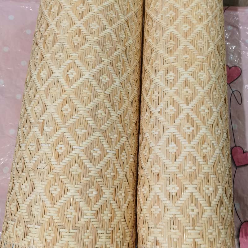 Sheet of natural rattan cane webbing with a diamond weave