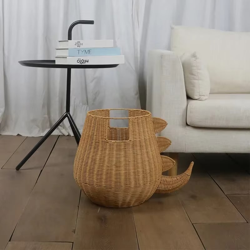 Rattan storage basket shaped like a dinosaur with woven spikes and tail