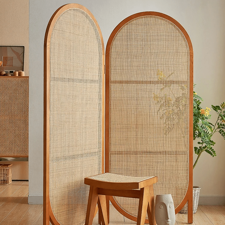 Two panel room divider with rounded oval tops in hand woven natural rattan