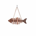 Fish shaped wall ornament made of driftwood pieces on a hanging cord