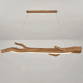 Long driftwood look resin LED pendant light with a textured weathered finish