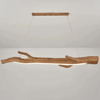 Long driftwood look resin LED pendant light with a textured weathered finish