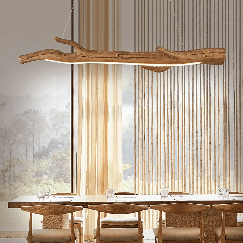 Long driftwood look resin LED pendant light with a textured weathered finish
