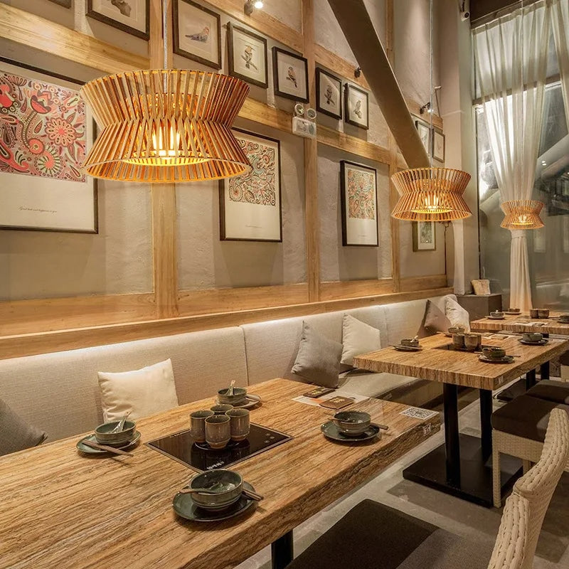 Elegant curved golden brown wood pendant light