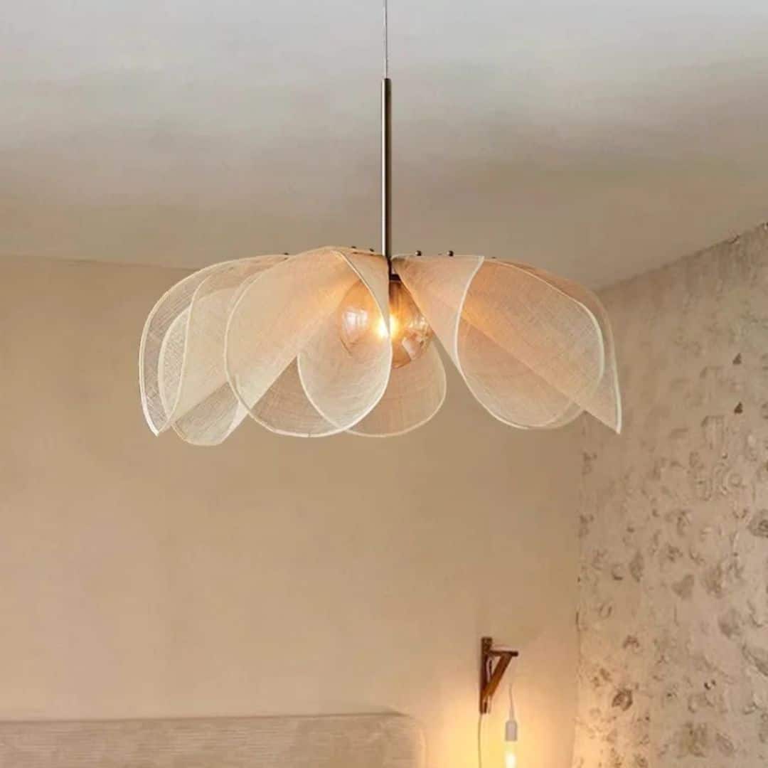 Beige fabric chandelier shaped like a large flower on an iron frame
