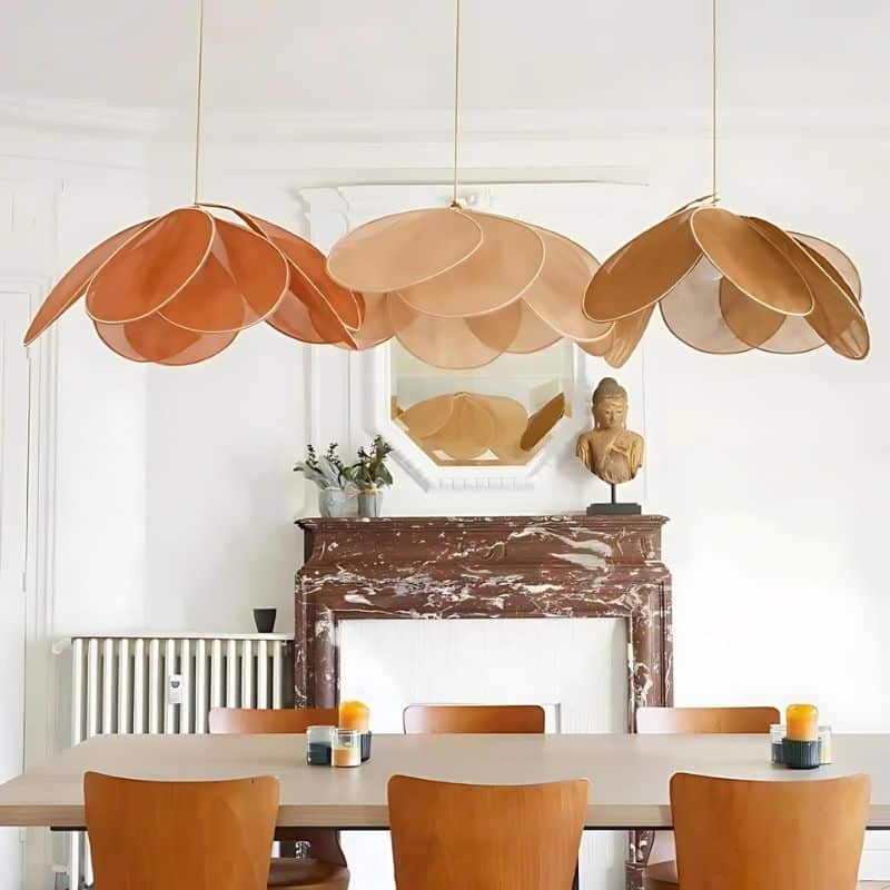 Large flower shaped fabric petal pendant light over a bed