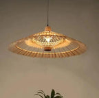Large fan shaped wall sconce hand woven in natural rattan