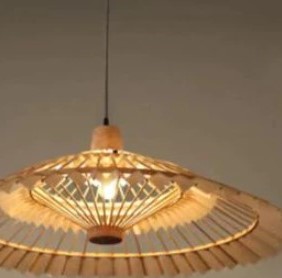 Large fan shaped wall sconce hand woven in natural rattan