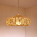 Flat disc pendant light handwoven in rattan and wicker
