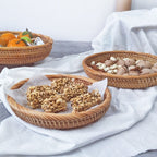 Flat round rattan basket holding nuts