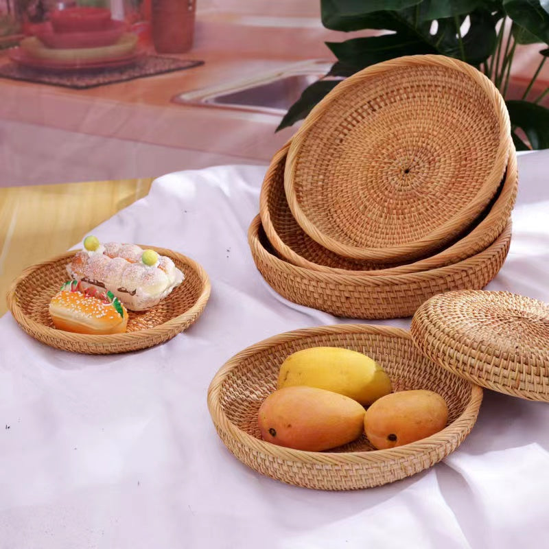 Flat round rattan basket holding nuts