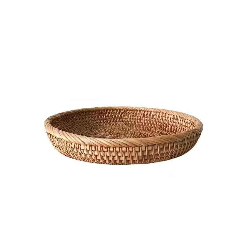 Flat round rattan basket holding nuts