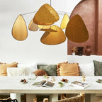 Brown chandelier made of layered floating fabric petals