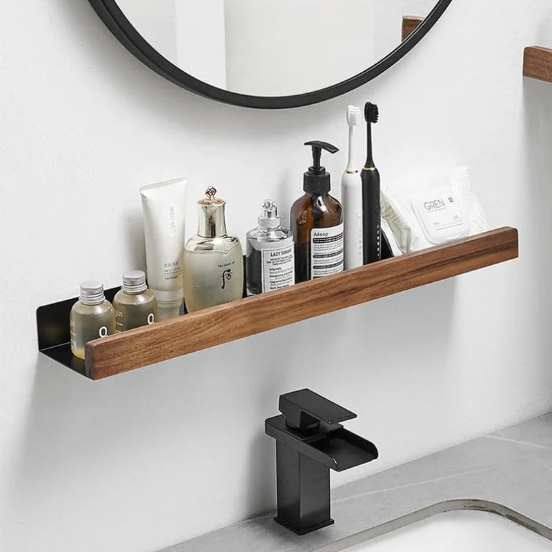 Slim floating wood ledge shelf with aluminum rail holding toiletries