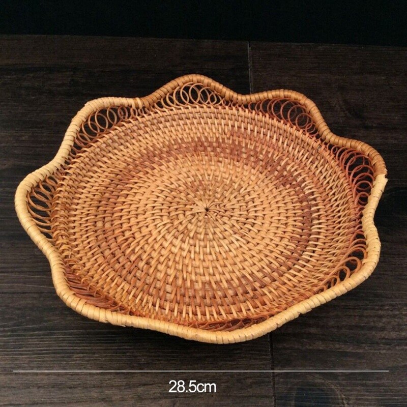 Flower shaped rattan fruit bowls holding oranges and bananas