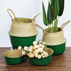 Stack of foldable woven belly baskets with green bases