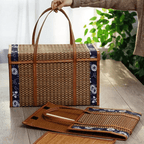 Suitcase style woven bamboo picnic basket with fabric trim and handles