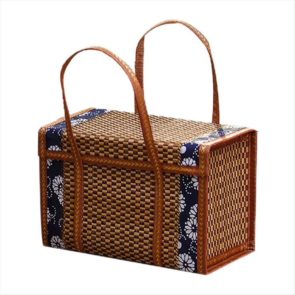 Suitcase style woven bamboo picnic basket with fabric trim and handles