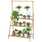 Tall folding bamboo plant stand with tiered shelves and hanging hooks