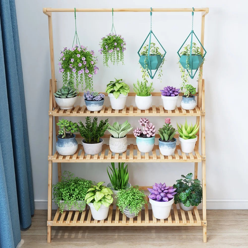 Tall folding bamboo plant stand with tiered shelves and hanging hooks