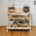 Folding two tier bamboo shelf in natural golden tone