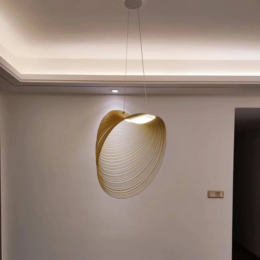 Sculptural futuristic pendant light made of finely cut natural wood slats