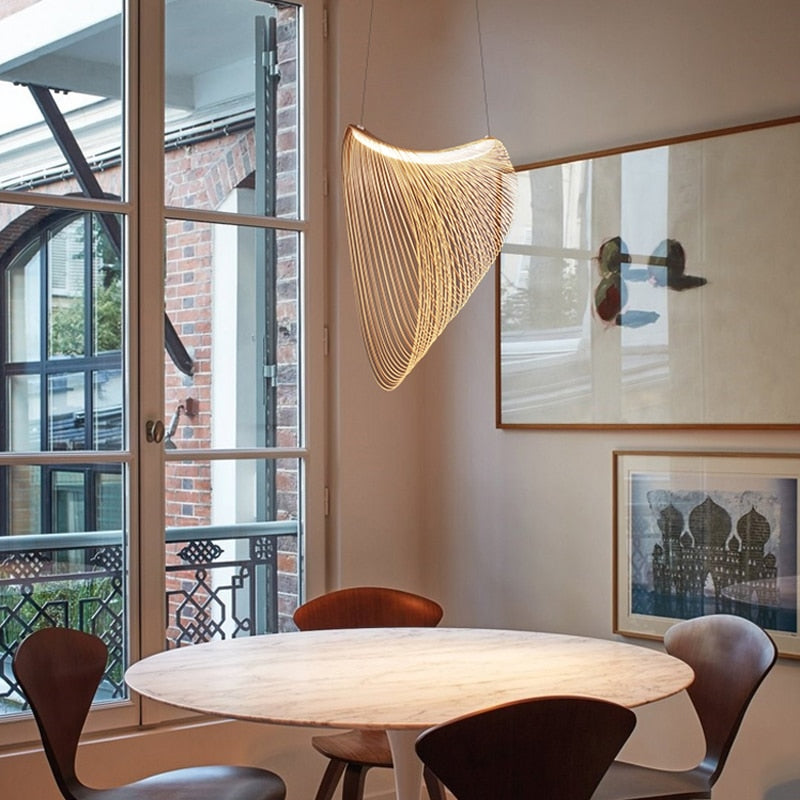 Sculptural futuristic pendant light made of finely cut natural wood slats