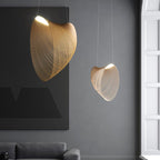 Sculptural futuristic pendant light made of finely cut natural wood slats